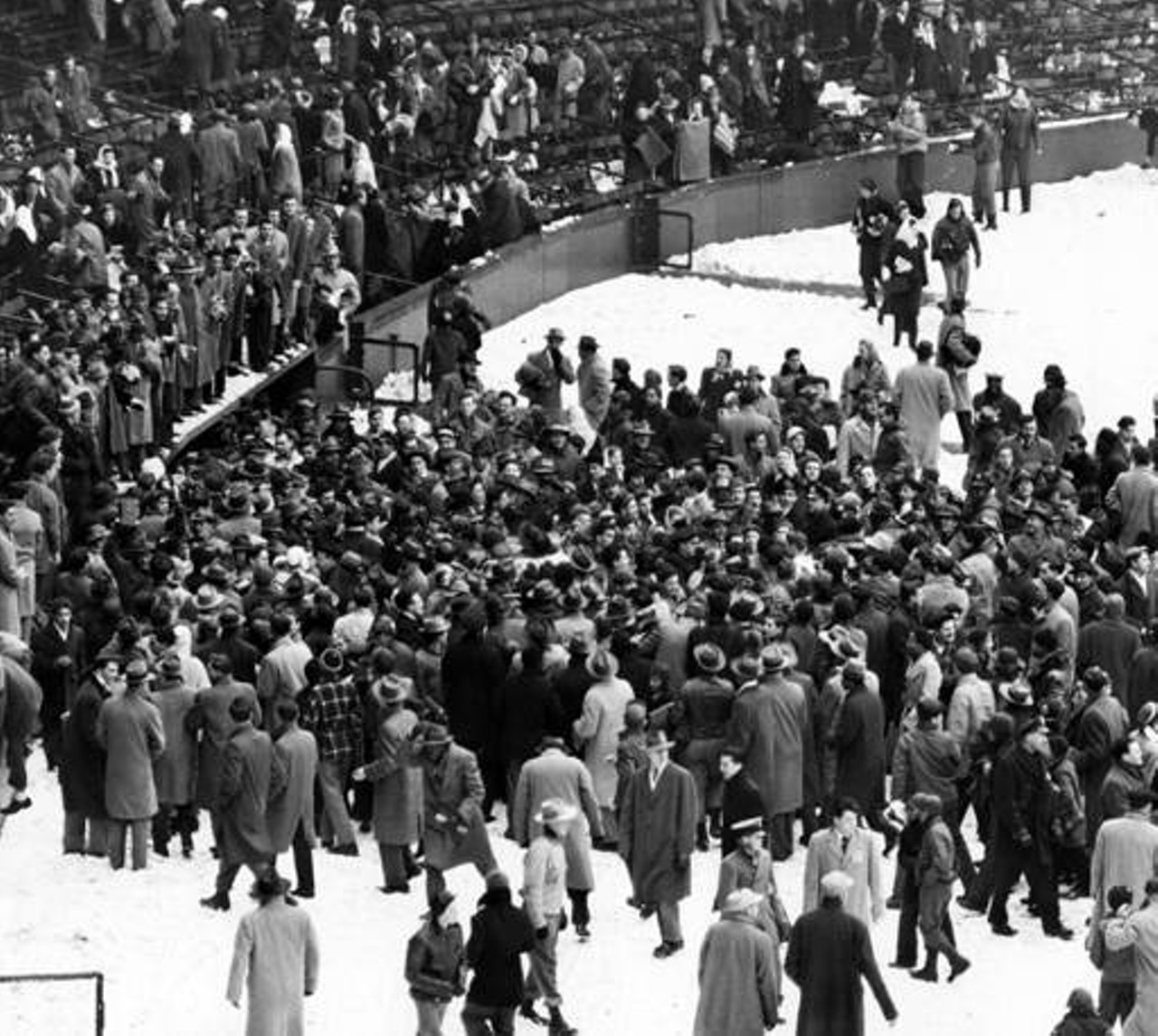 Browns fans storm the field after the team wins the 1946 AAFC championship game against the New York Yankees.