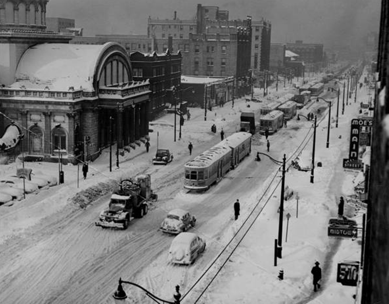 Commuters battle the snow on Euclid Avenue, 1950s.