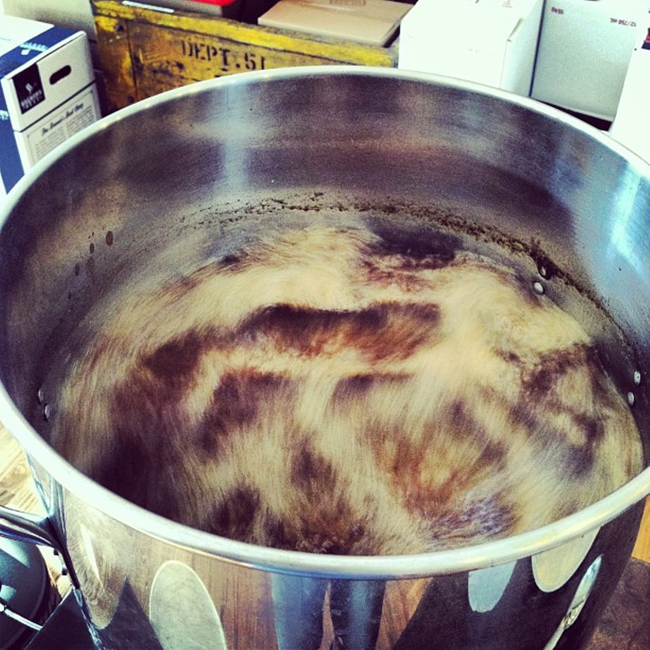 Drain off the liquid and drop the unfermented beer into some water for boiling.