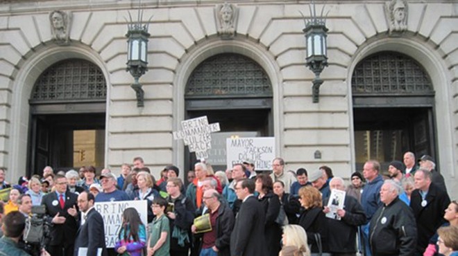 Keith Sulzer supporters gather outside City Hall on March 31.