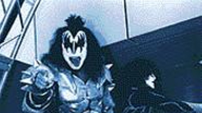 Knights in customer service: Kiss's Simmons and Stanley preen for the Rock Hall crowd.