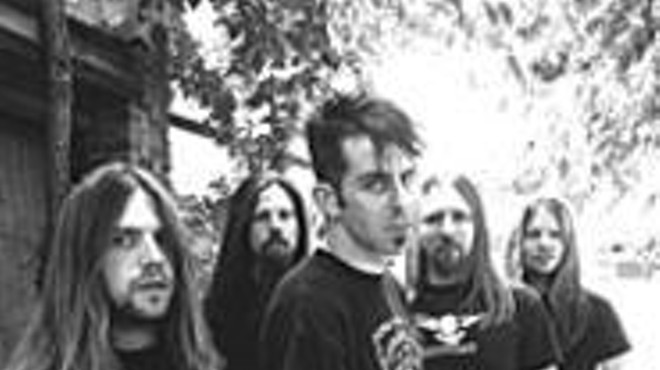 Lamb of God frontman Randy Blythe (center) wants 
    you to drink lots of water before seeing his band play.