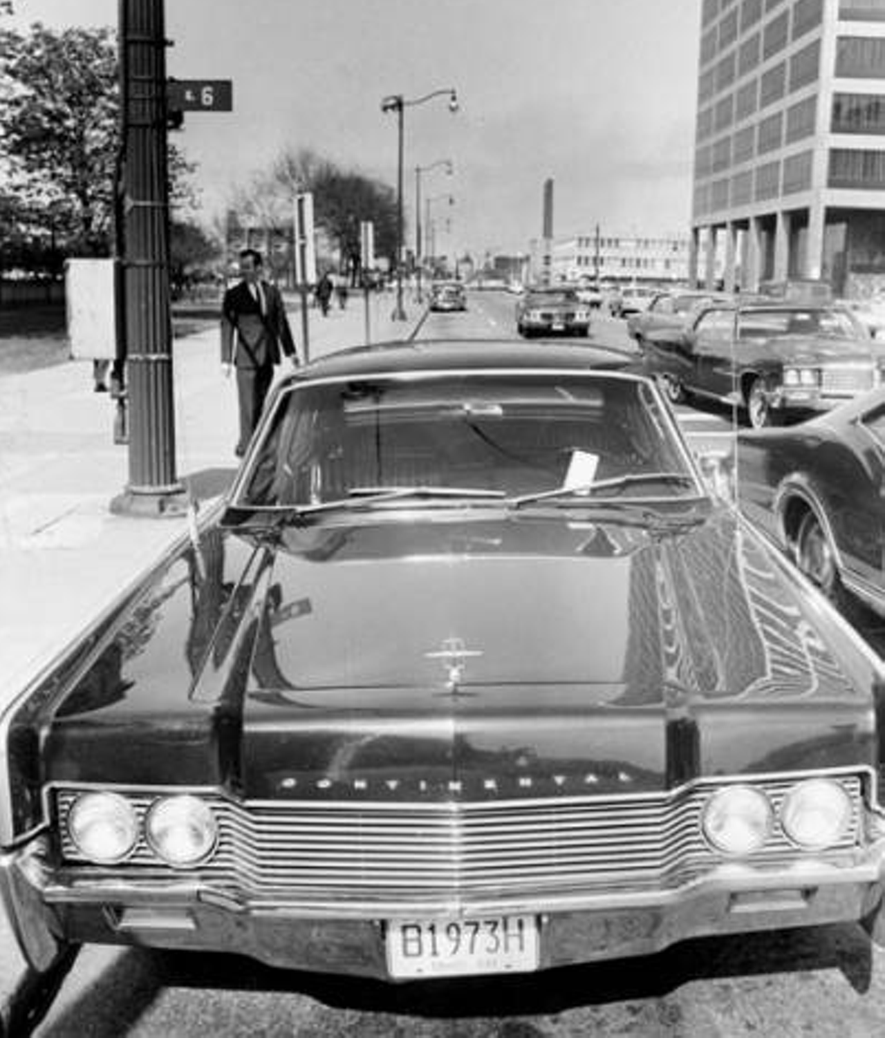 Mayor Carl B. Stokes's limousine is issued a parking ticket, 1968.