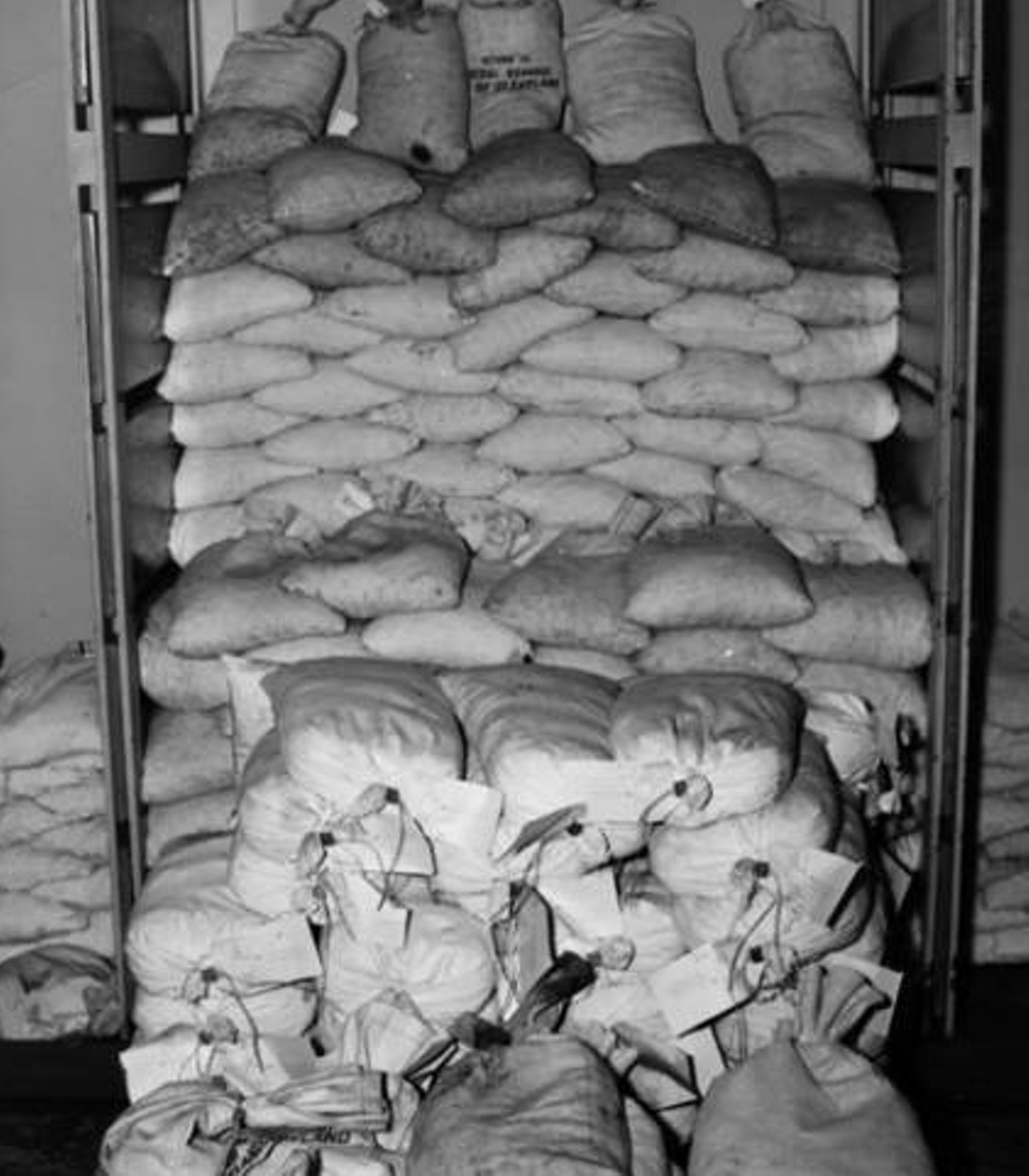 Money in sacks piled high at the Federal Reserve Bank of Cleveland, 1940.