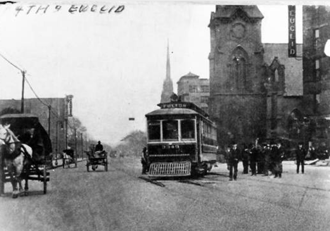 Photo depicts the corner of E. 14th and Euclid circa 1900. A church stands where the Hanna Building is now located.
