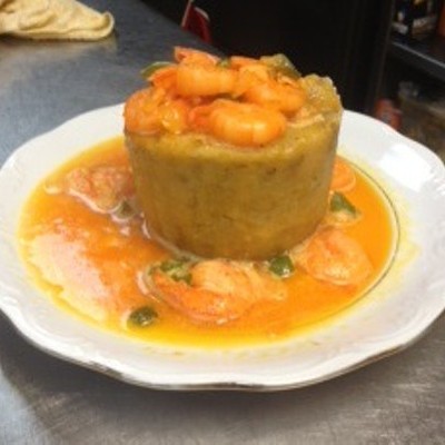 Rincon Crillo in Gordon square does this Puerto Rican dish proud. Starting with mashed plantains in a wooden mortar, garlic, olive oil, and seasoning are then added to the mixture. Served in a ball, Rincon's Mofongo must have shrimp added.