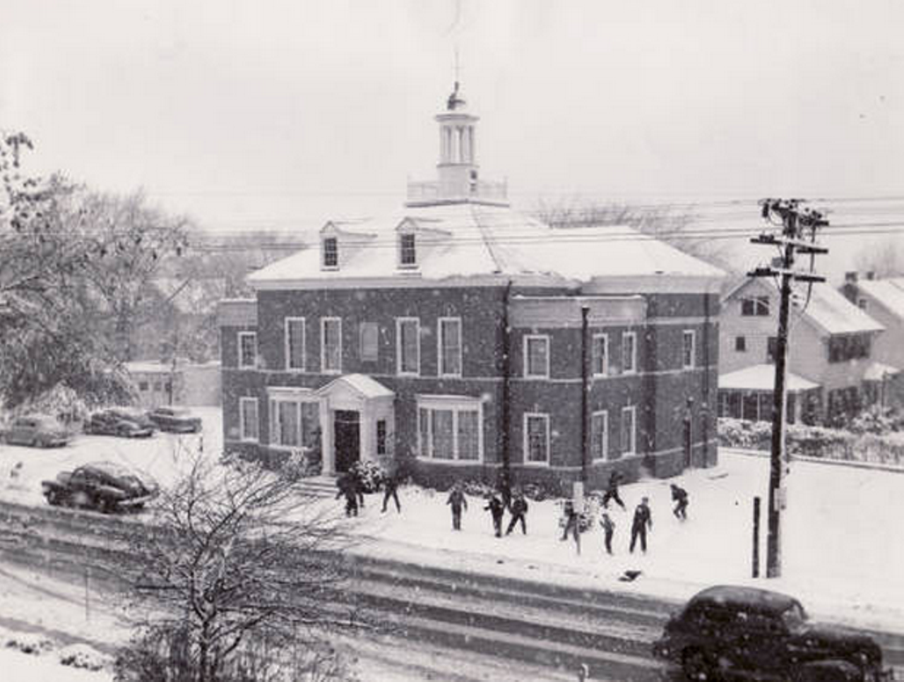 Snowball fight outside the old YMCA building in Cleveland Heights, date unknown.