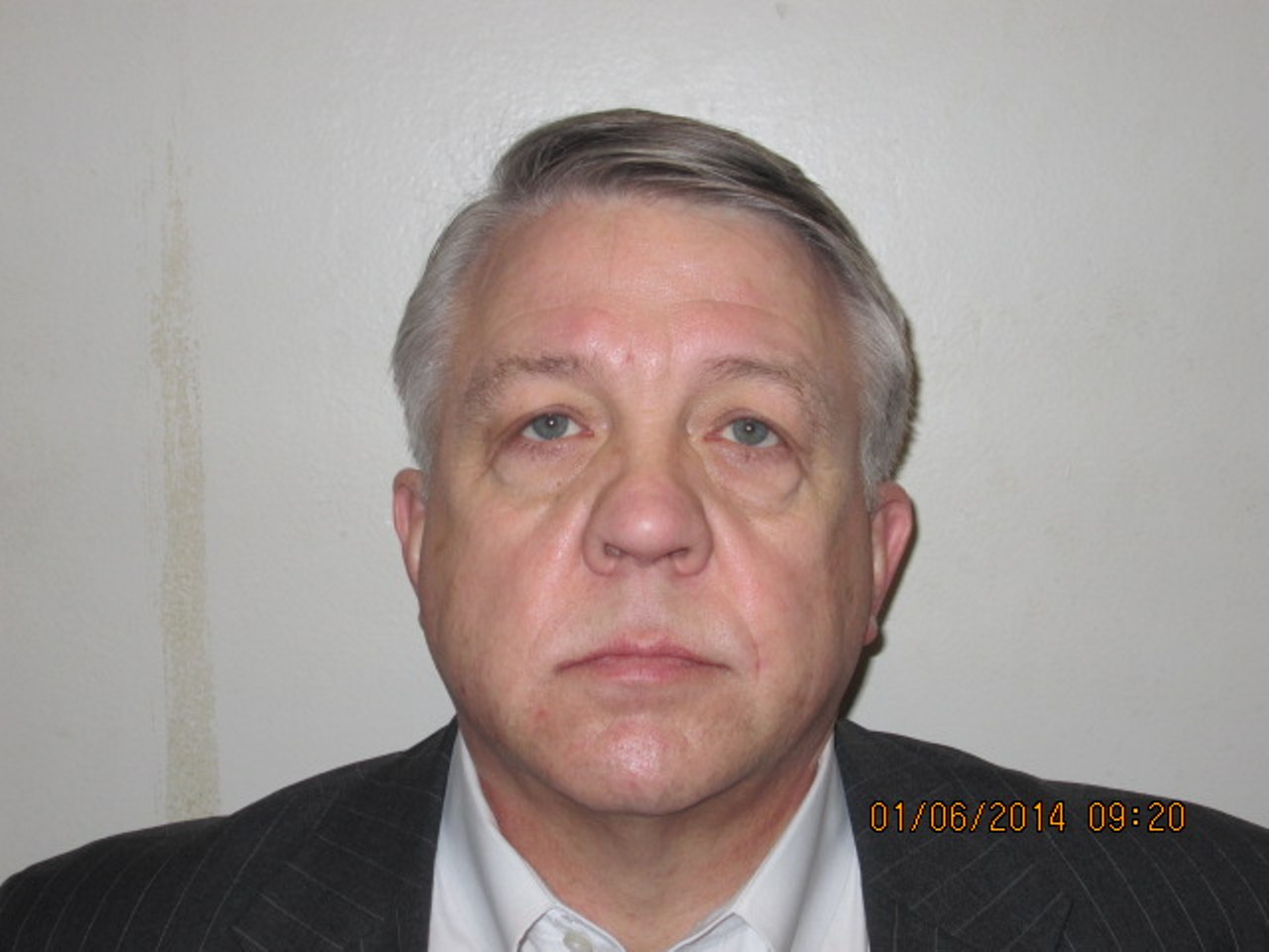 The judge's booking photo after his corruption arrest
