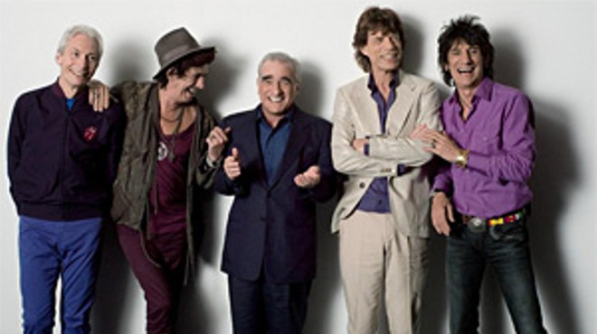 The Rolling Stones have no clue how the short Italian guy got in the picture.