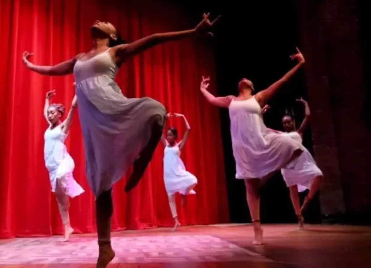 31ec2d0d_women_dancing_on_stage_karamu_theatre.webp