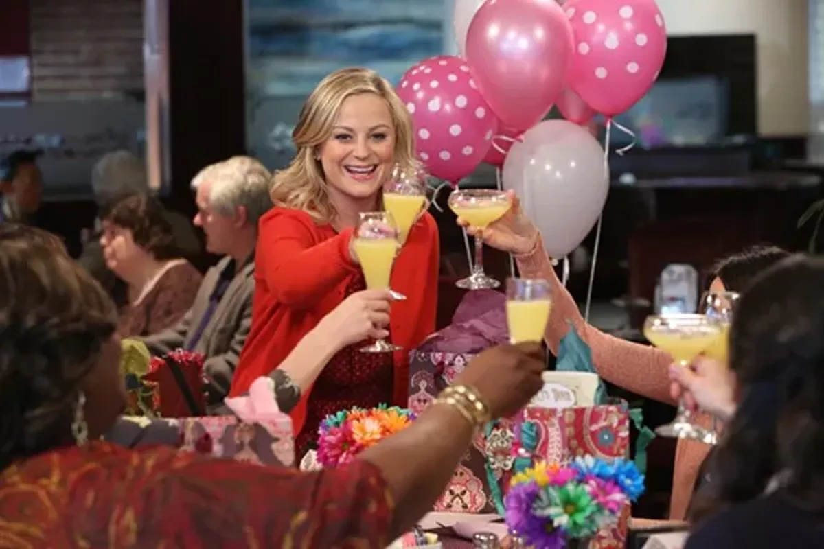 parks-and-recreation-leslie-knope-galentines-day-cheers.webp