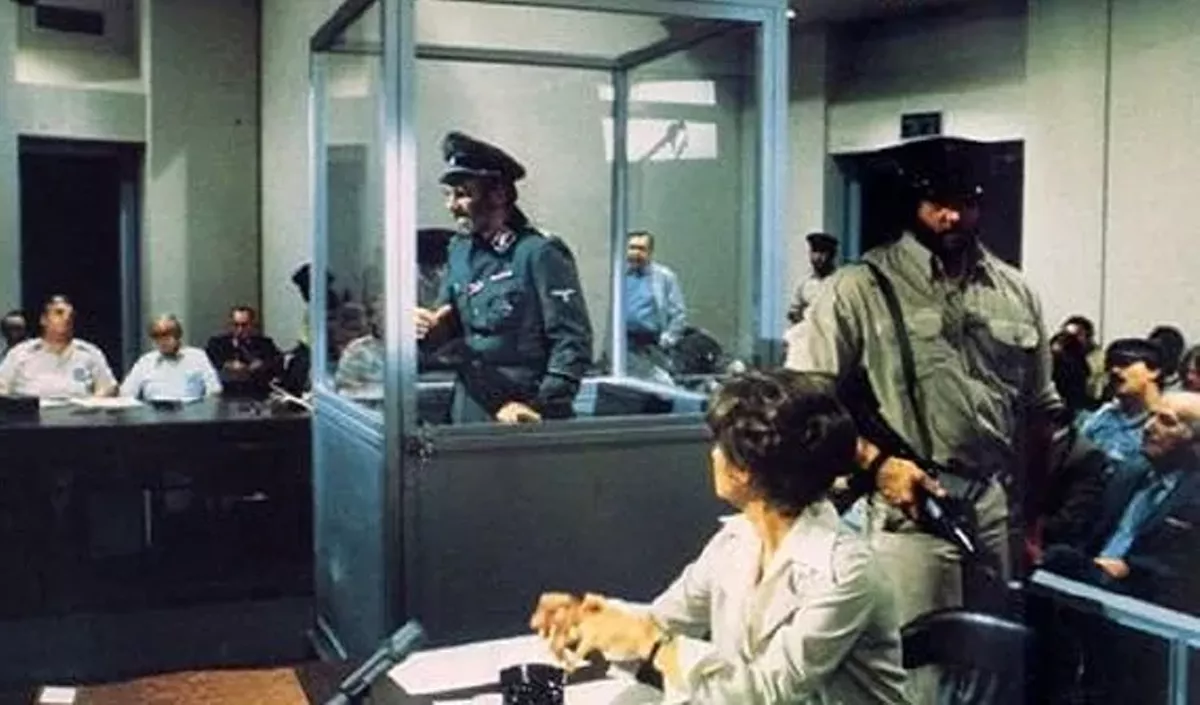 6925ff4a_16manintheglassbooth.webp
