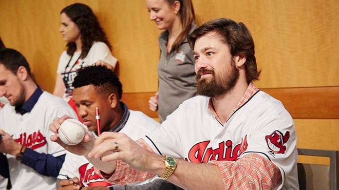 Andrew Miller and Jose Ramirez sign autographs for fans at the 2017 TribeFest