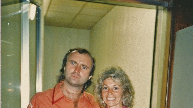 Phil Collins celebrates his birthday with Fran Belkin.