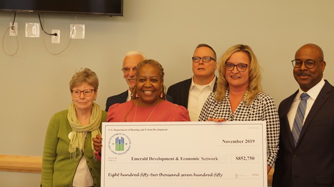 Ruth Gillett (County Homeless Services), Pamela Ashby (HUD), and Elaine Gimmel (EDEN), among others, with ceremonial check.