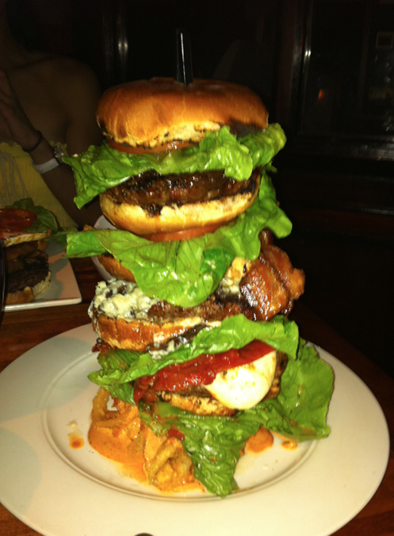 Where: Touch Supper Club - 2710 Lorain Ave Ohio City
Challenge: If you are adventurous, you can attempt this burger behemoth. It is free if you finish, or $30 if you fail. First is the tower of beef comprised of 3 lbs. of meat with three complete buns, and a variety of toppings that switch every Tuesday. If you even get past the burger, you must also scarf down the side of frites, plus a draft beer.
Prize: Bragging rights
Cost: $30 or free if you finish