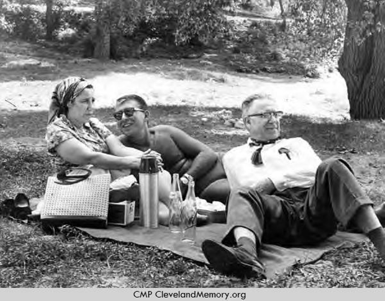 Couple and their son enjoy picnic, 1961