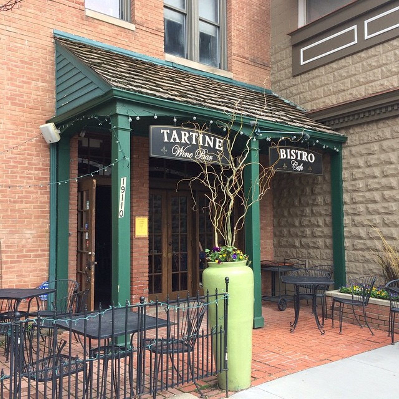 When you want to impress your snotty East Side pals - Tartine Bistro 
Let's face it: Eastsiders can be a tad judgmental when it comes to the far-West Side dining scene. But even the most jaded of urban explorers will leave Tartine Bistro (19110 Old Detroit Rd., 440-331-0800, tartinebistro.com) in Rocky River with newfound respect. The compact brick-paved courtyard is the ideal spot to sip wine, snack on small plates, and make some new friends. (Photo via Yelp, tsgcleveland)