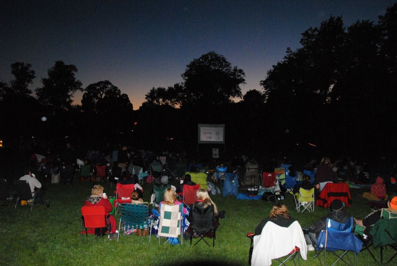 Get your dose of movies in the park by setting up your laptop to watch your favorite flick under tons of blankets. 
Photo courtesy of Free Akron Outdoor Movies, Facebook