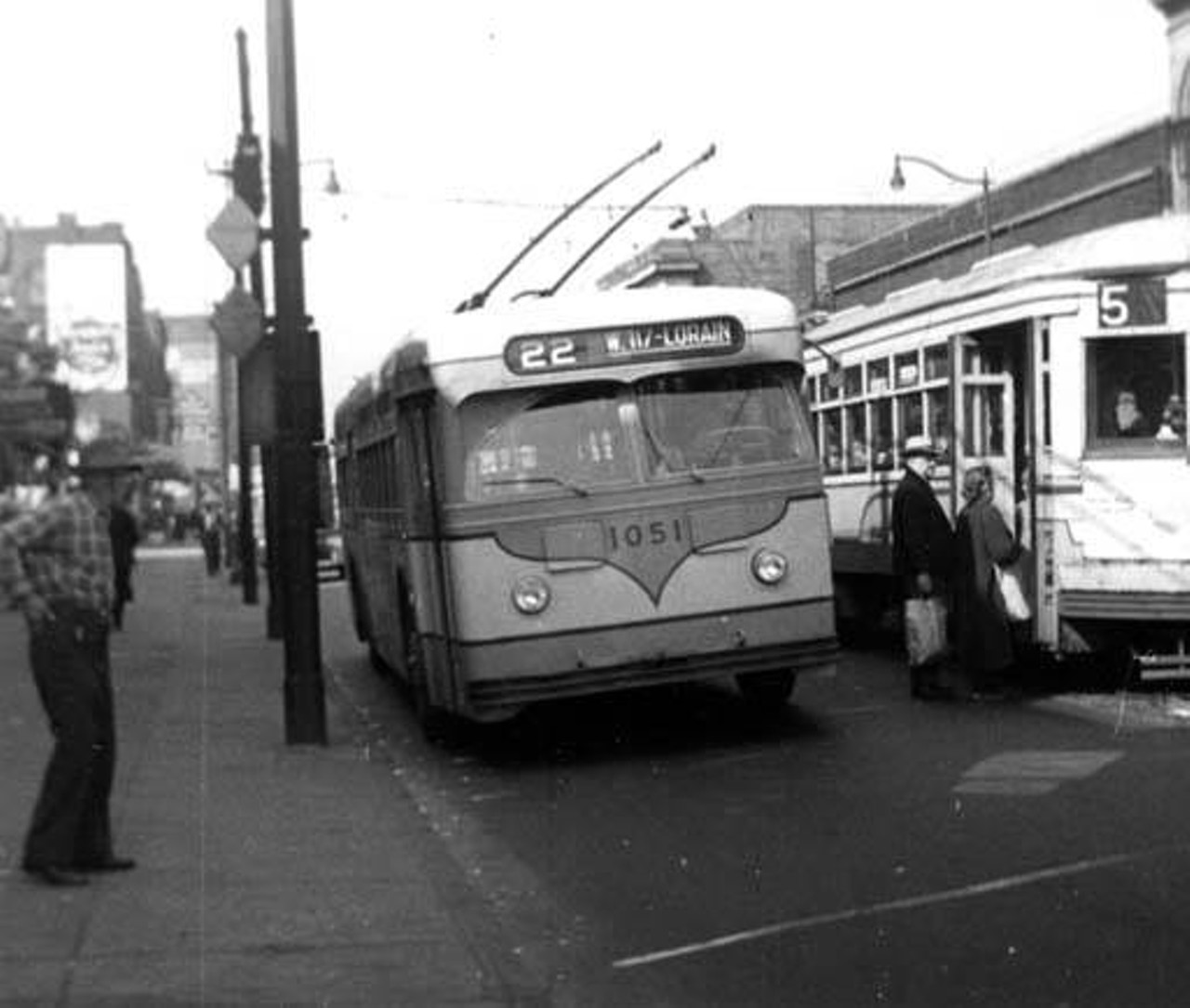 Cleveland Transit Car and Trackless Trolley at West 25th St. and Bridge Ave., date unknown.