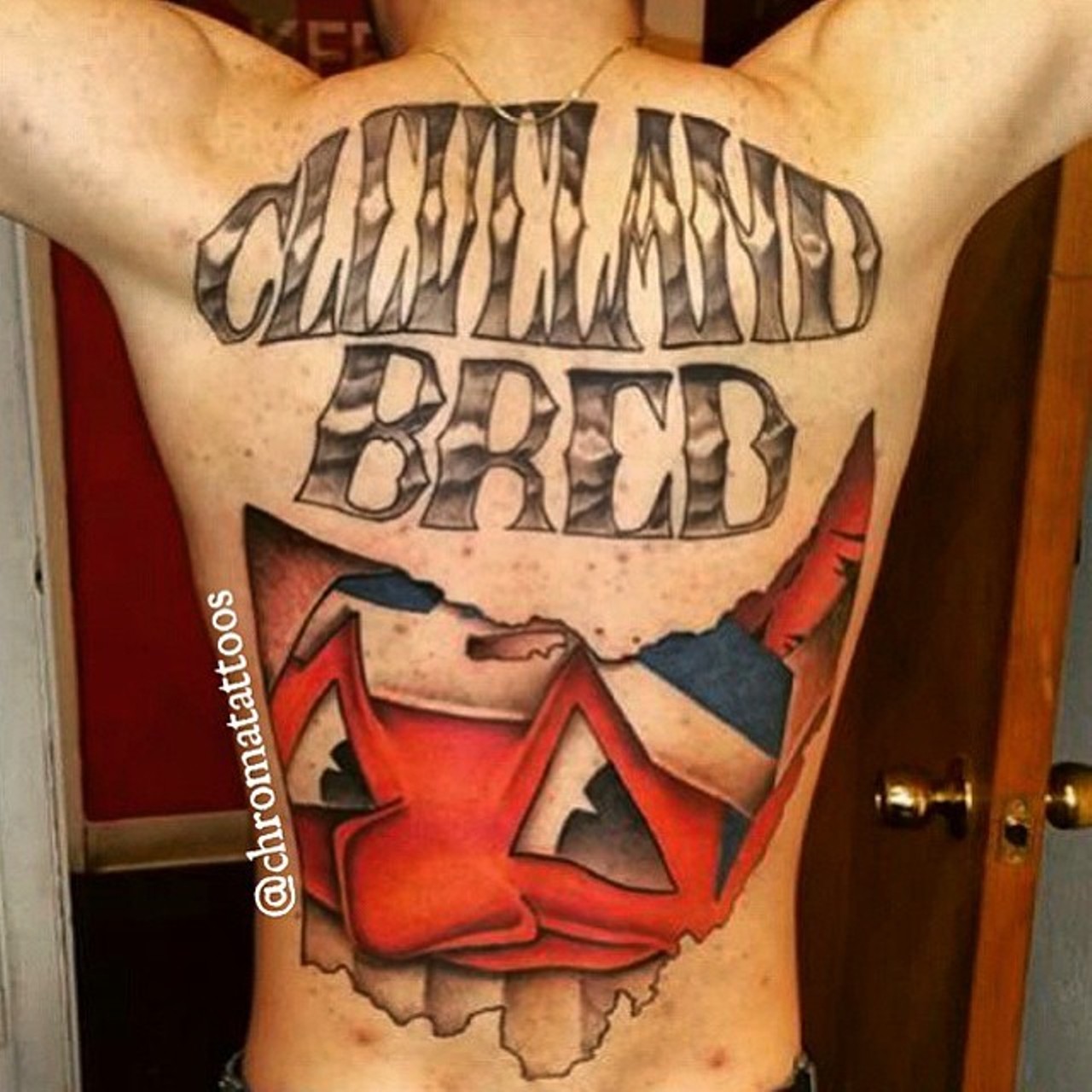 This tattoo oozes Cleveland pride in a big way. Chief Wahoo beams his iconic smile in a frame of the Buckeye State (Photo courtesy of Instagram user @galleria1796).