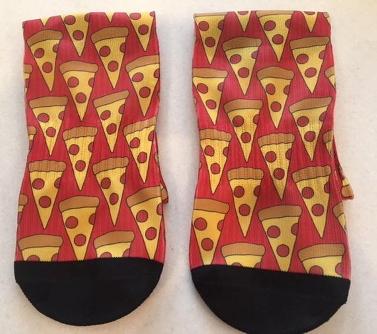  Alex&#146;s Ausome Socks 
Found at: Merchant Mrkt, 24687 Cedar Rd., Lyndhurst
Cost: $14.95
Alex's Ausome Socks company not only make socks that are perfect for the holiday season, but with a purchase you are giving hope to young kids diagnosed with autism. Alex&#146;s mom told Scene that he loves pizza and these socks are a great gift for the significant others and kids who also love some pie.