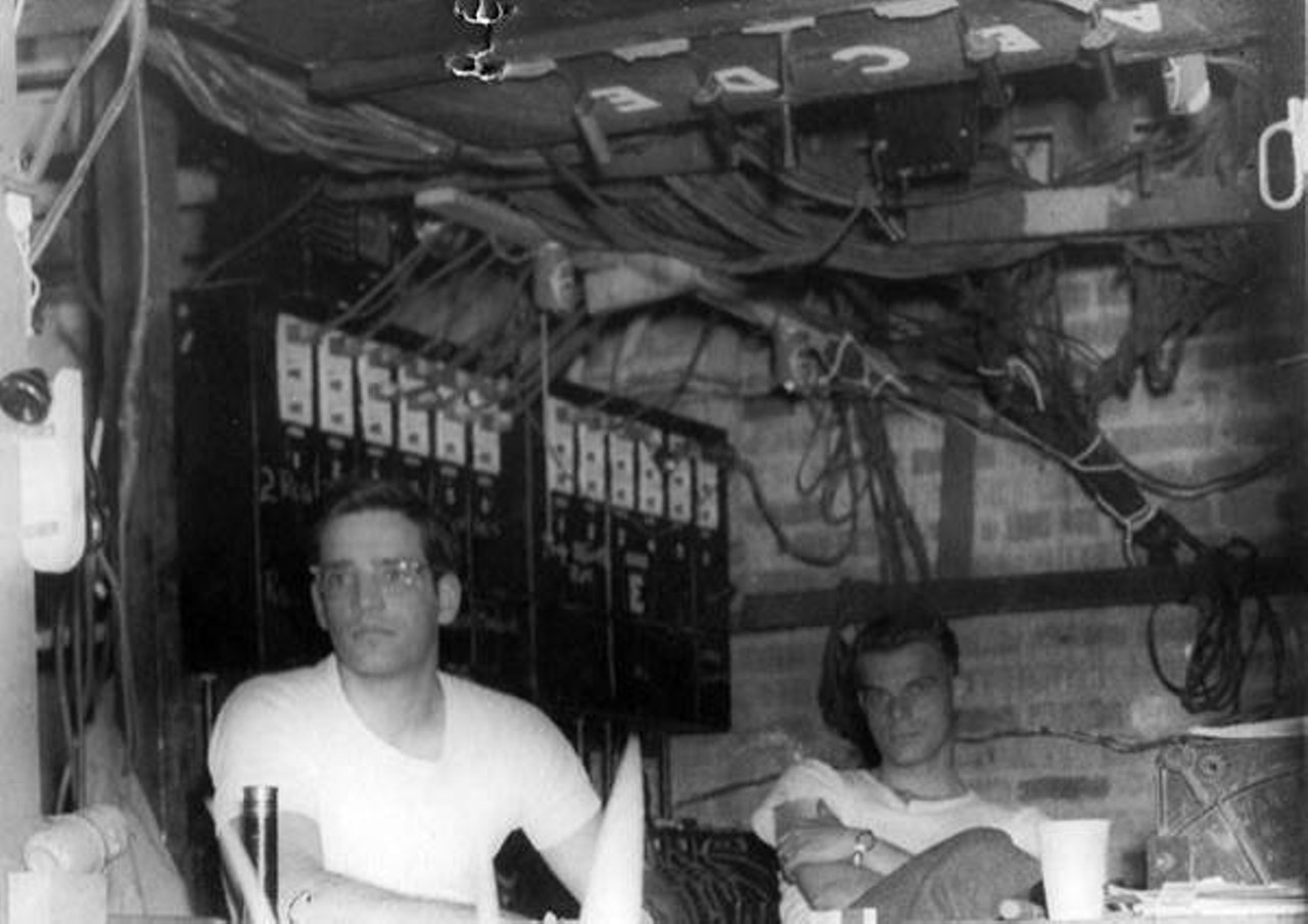 Crew members man the interior lighting booth, 1945.