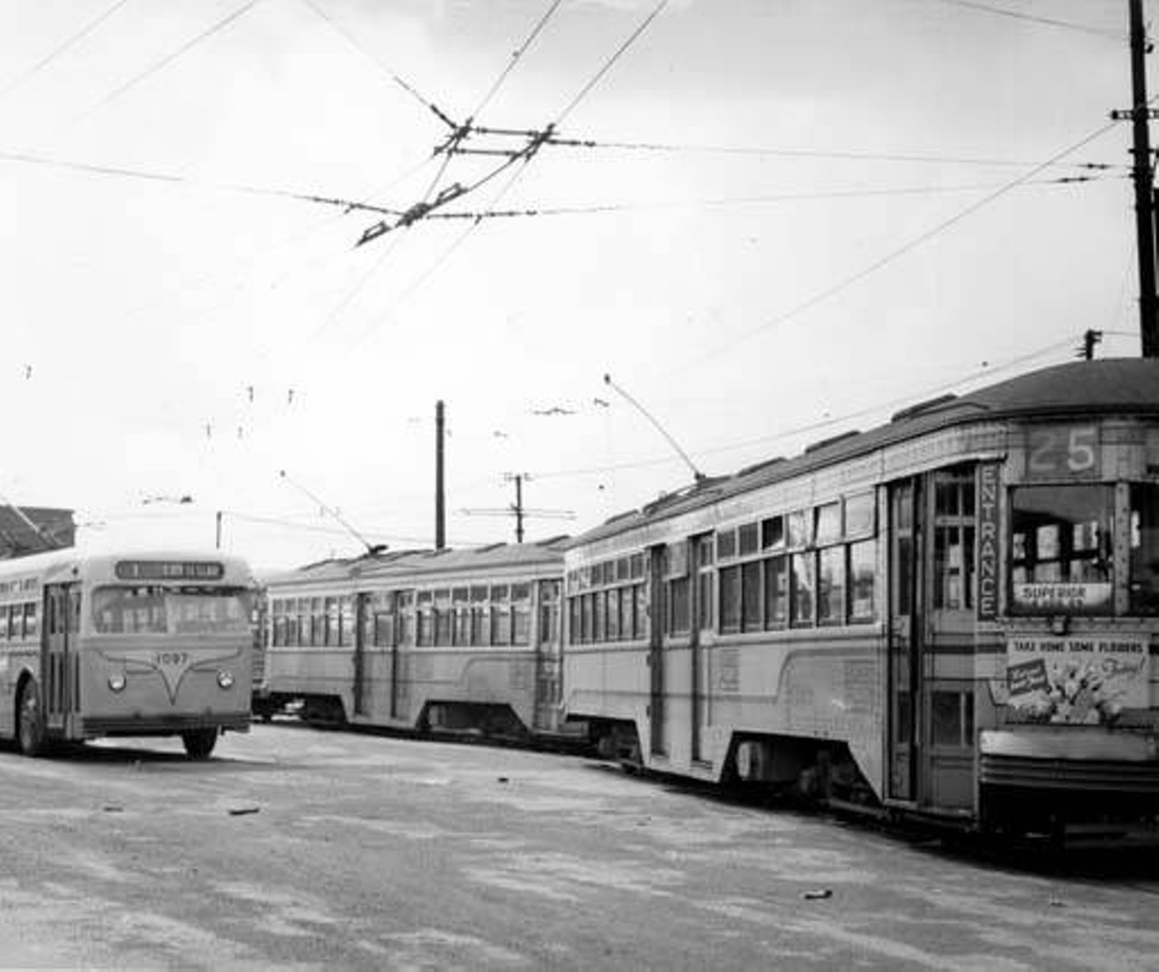 Cleveland Transit Car 4103 and Trackless Trolley 1097 at St. Clair Station in Cleveland, Ohio.