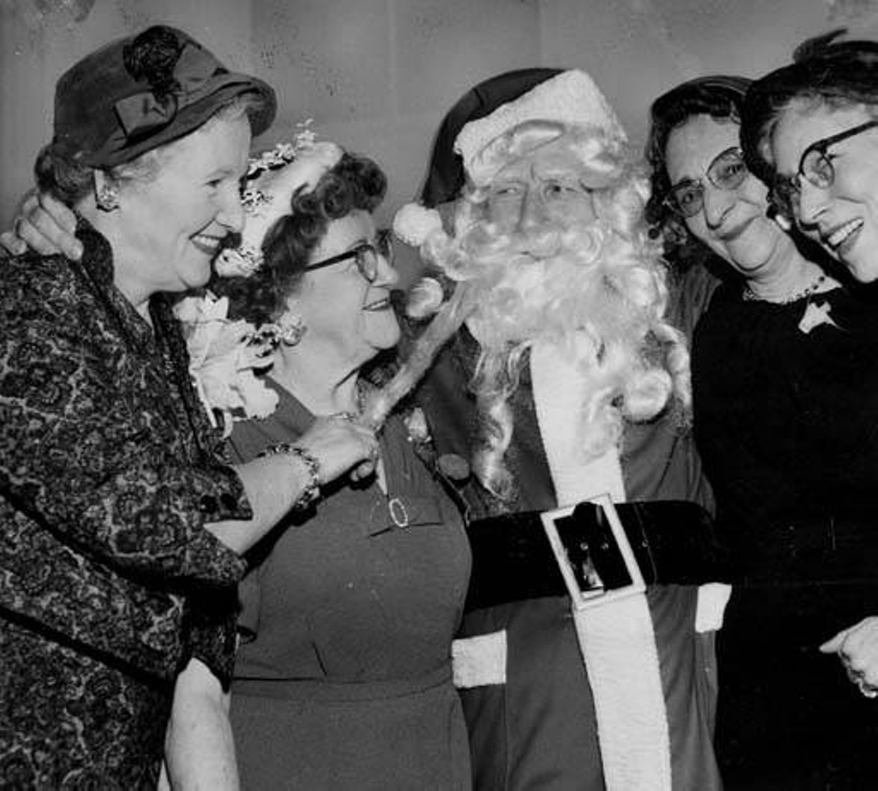 Employees with Santa at May Co., 1958.