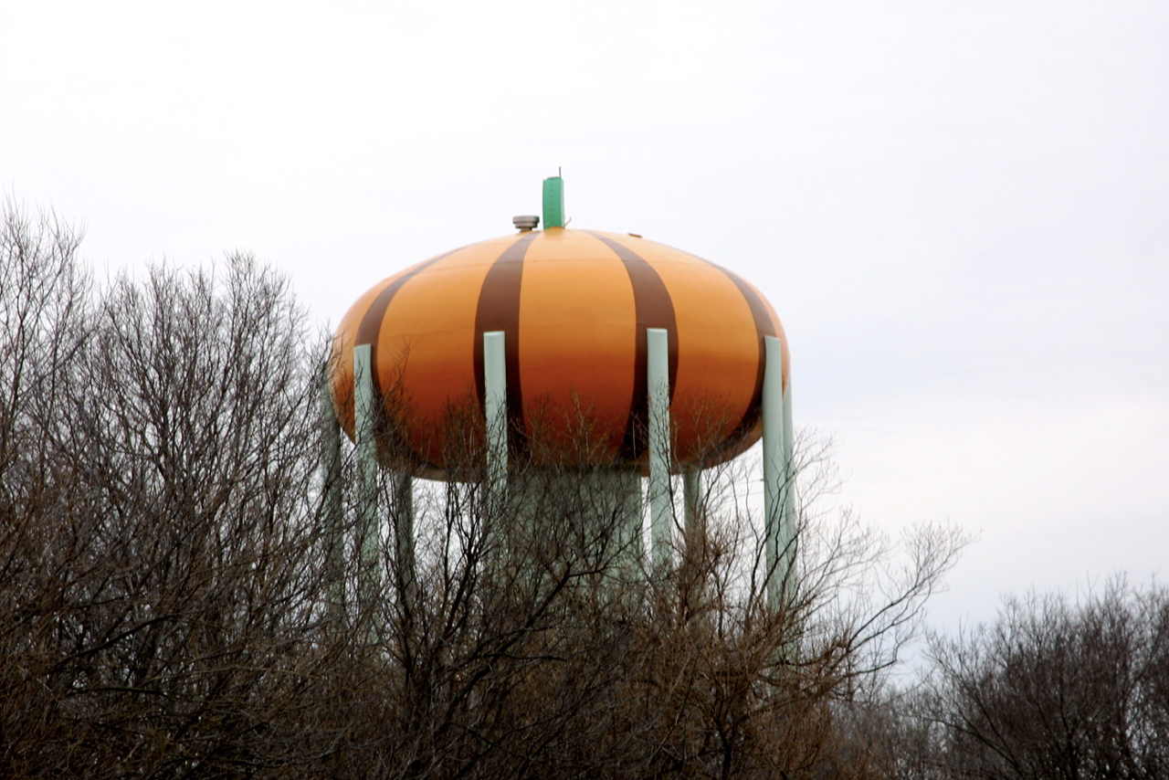  Pumpkin Water Tower
Logan St., Circleville 
Circleville, about 30 miles south of Columbus, is known for their annual Pumpkin Festival, which they bill as the “best free festival on Earth.” What better way to promote the biggest thing in town than painting the town water tower to look like a pumpkin!