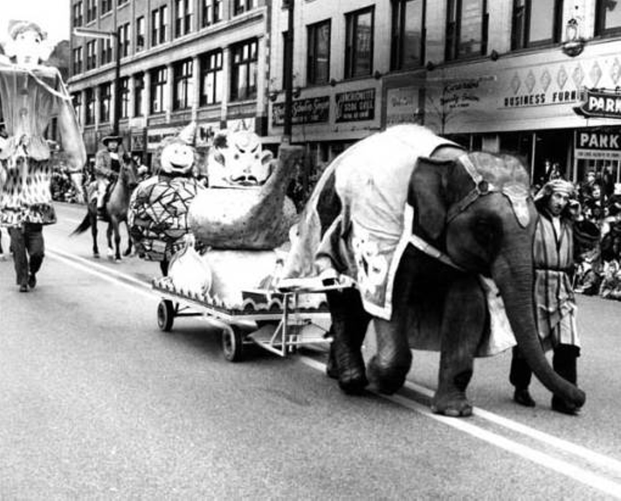 Elephant and floats in Cleveland Christmas parade, 1963.