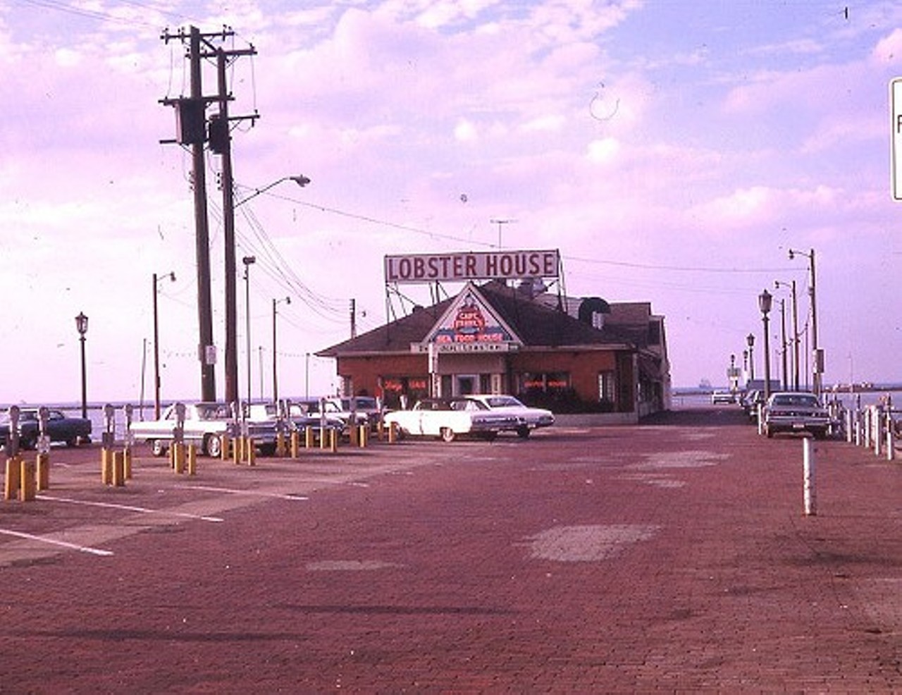 Captain Frank&#146;s
East Ninth Street Pier, Cleveland 
At the end of the East Ninth Pier, before the Rock Hall and the Science Center were there, Captain Frank&#146;s was the place to go, for the &#147;finest and most delightful dinner on the shores of Lake Erie."
Photo via Scene Archives