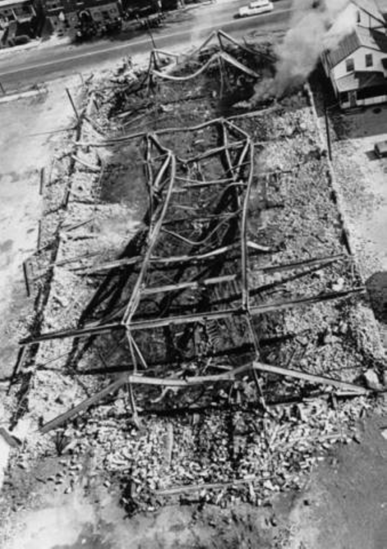 Aerial view of a building destroyed by fire in the 1966 Hough Riots