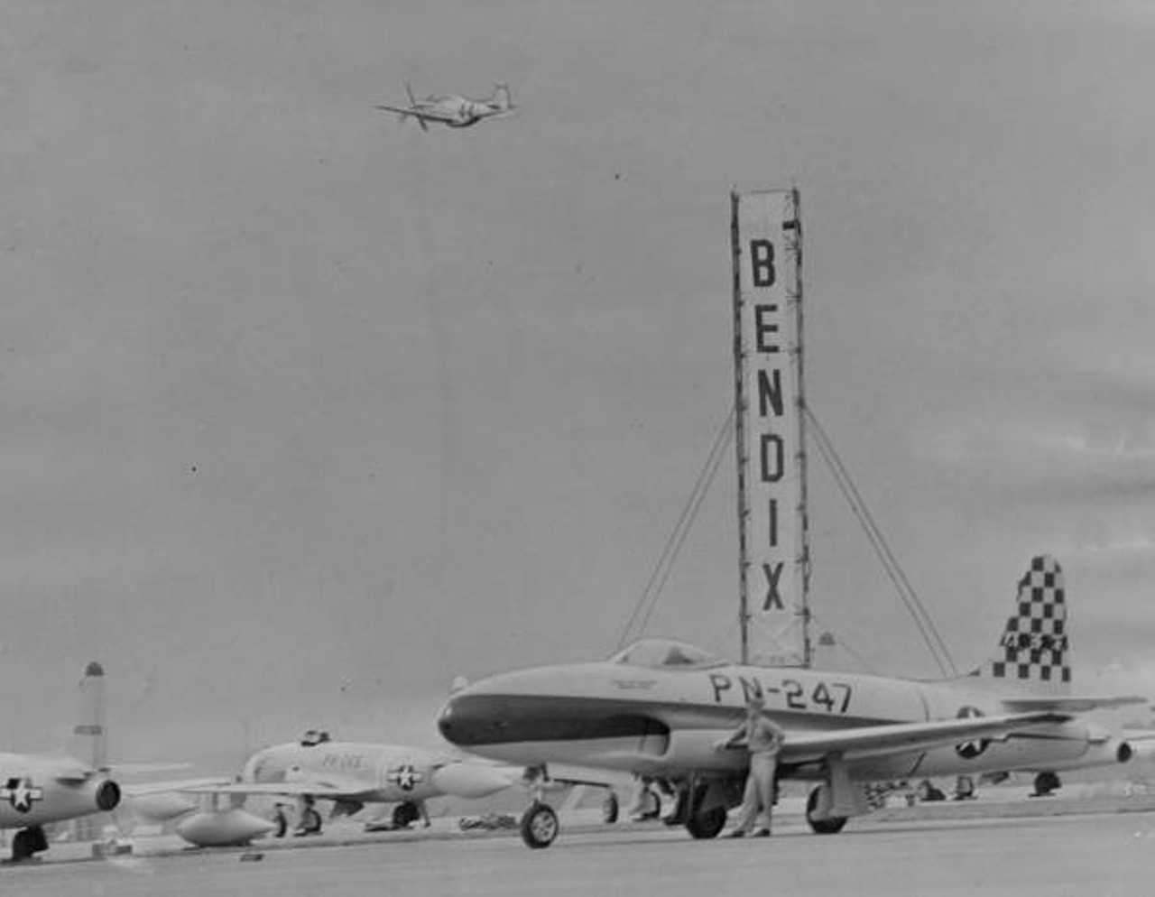 Aircraft on the tarmac and in the sky during the 1946 Cleveland National Air Races