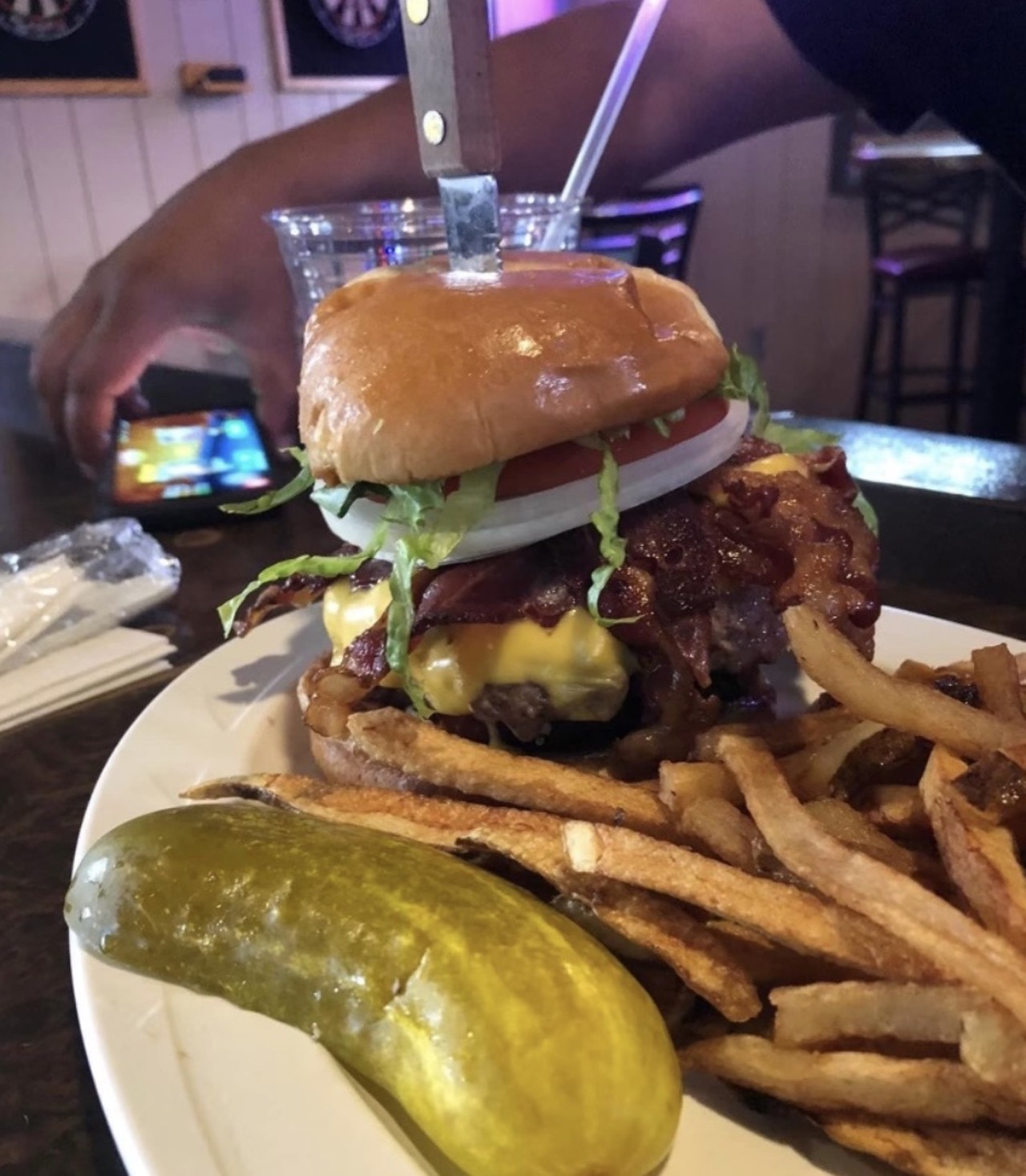 49TH STREET TAVERN
49th Street Burger: 10oz hand-formed patty cooked to your liking topped w/ lettuce, tomato, and onion on a brioche bun. Served with homemade chips and a pickle.
BREW KETTLE SPECIAL: Burger and Brew Kettle Beer for $10