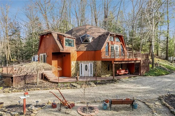 $569,000 Lake County Dome Home Sits On 17 Acres With Four Waterfalls