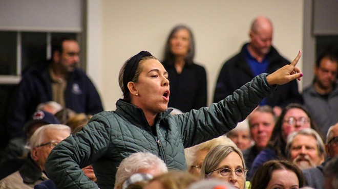 Many residents present had concerns about their family and their property. "I'm going to probably be putting a target on my back," one woman said. "But this is my backyard, and I can't have somebody come into my neighborhood who has connections to a variety of communities."