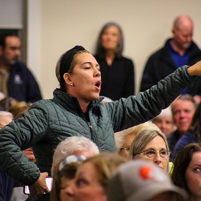 Many residents present had concerns about their family and their property. "I'm going to probably be putting a target on my back," one woman said. "But this is my backyard, and I can't have somebody come into my neighborhood who has connections to a variety of communities."