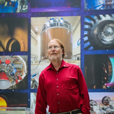 Landis at NASA Glenn in late July. He says both realms of work influence each other. "Science fiction is the inspiration. Science fiction looks at both. What's possible that would be cool. What do we want?"