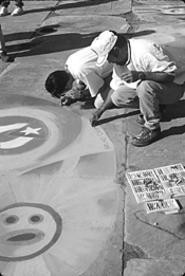 Artists craft their art at the Chalk Festival.