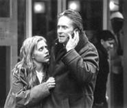 Brittany Murphy clings to oppressed mensch Michael Douglas in Don't Say a - Word.