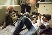 Director Len Wiseman frames Bruce Willis in Live Free or  Die Hard.