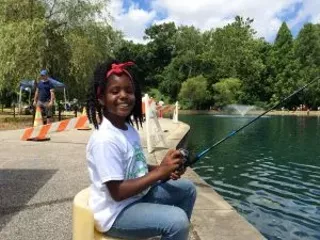 Girl fishing at Rockefeller Lagoon.