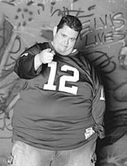 Extra-large comedian Ralphie May brings the yuks to - the Improv this week.