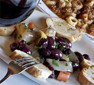 Il Bacio dishes up top-notch service, along with a delightful mix of marinated olives and carrots. - WALTER NOVAK