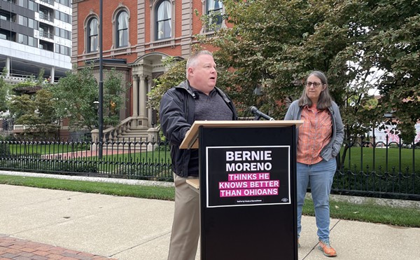 Arthur “Ed” Dunn speaking outside the Columbus Club in downtown Columbus.