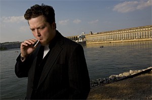 Jason Isbell contemplates the serene shoreline with a healthy drag of a cigarette.