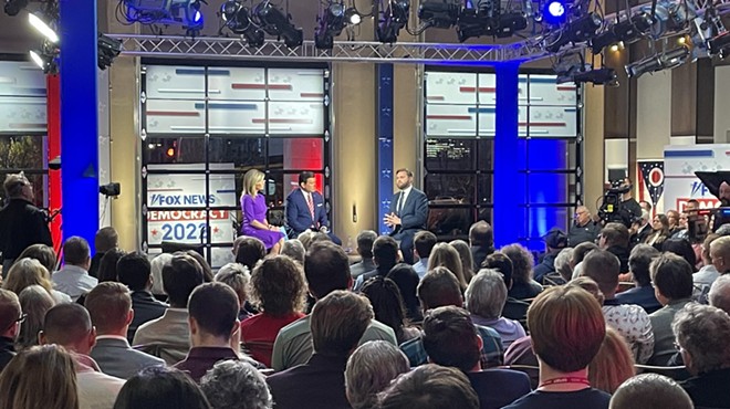 J.D. Vance answering questions on stage at a FOX townhall in Columbus.