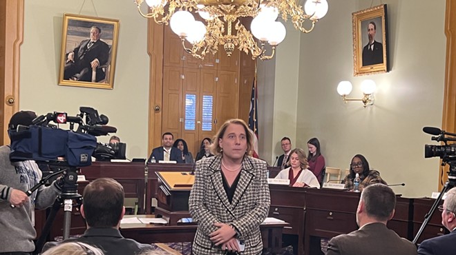 Amy Schneider, Dayton native and Jeopardy! champion, leaves the Ohio House Families, Aging and Human Services Committee after testifying against House Bill 454. Schneider, who is a trans woman, said the bill would be “tragic” for Ohio children.