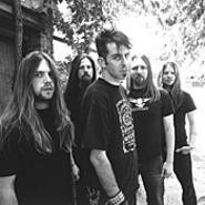 Lamb of God frontman Randy Blythe (center) wants - you to drink lots of water before seeing his band play.